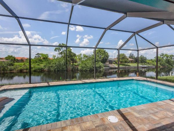Cape Coral 4 Bedroom Home with Canal View & Dock