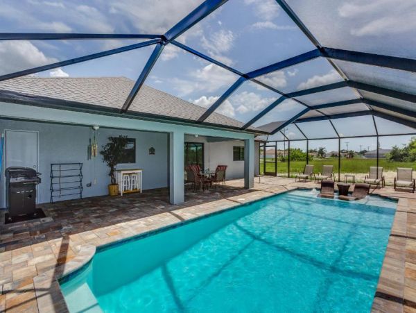 Cape Coral 4 Bedroom Home with Canal View & Dock