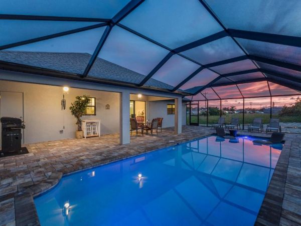 Cape Coral 4 Bedroom Home with Canal View & Dock