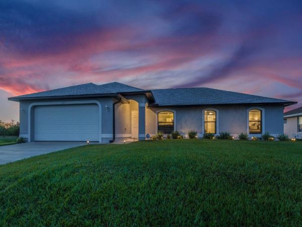Cape Coral 4 Bedroom Home with Canal View & Dock