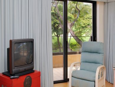 Master bedroom sitting area with TV
