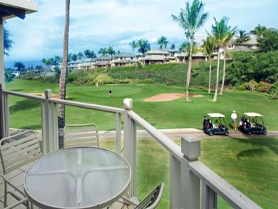 Golf front view balcony with table set