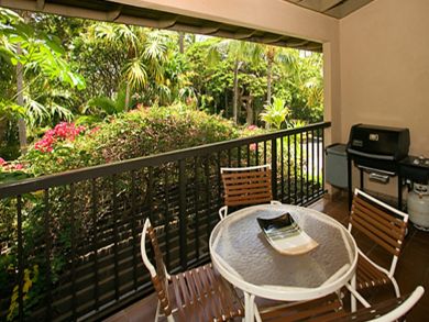 Balcony with table set & gas grill