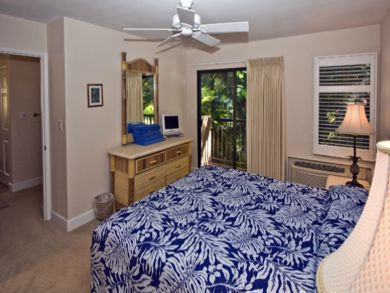 Bedroom with TV & balcony