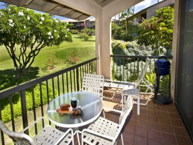 Balcony with table set & BBQ grill
