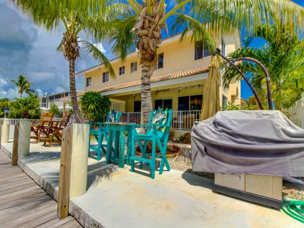 Key Colony Three Bedroom Family Home with Canal Front Porch