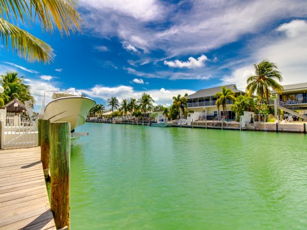 Key Colony Three Bedroom Family Home with Canal Front Porch