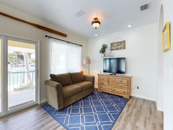 Key Colony Three Bedroom Family Home with Canal Front Porch