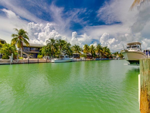 Key Colony Three Bedroom Family Home with Canal Front Porch