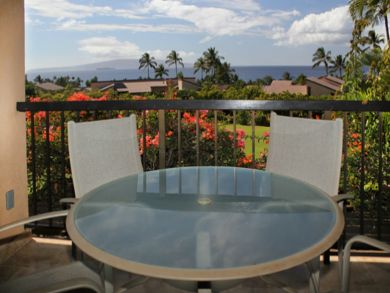 Balcony with table set & ocean view