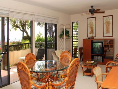 Open plan living & dining areas open to porch