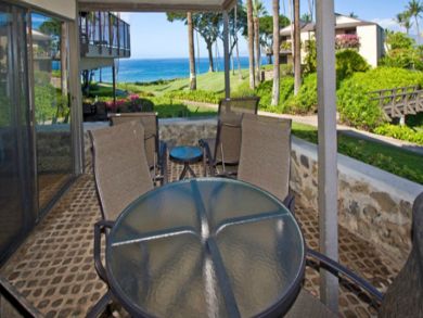 Ocean view patio with outdoor furniture