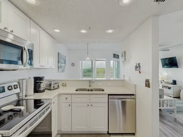 Anna Maria Island Vacation Rental Holmes Beach - Dog Friendly Condo with Heated Pool