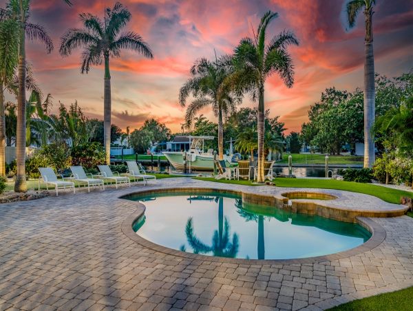 Luxury Canal Front Home Near Anna Maria Beaches - Four Bedroom Pool & Water Views