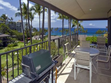 Balcony with outdoor furniture & gas grill