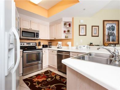 Spacious Three Bedroom Vacation Beach Condo Sleeps 8