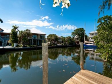 Coastal Cottage Set Along Waterway with Private Dock