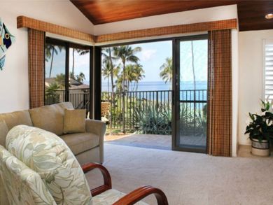 Living room open to corner lanai