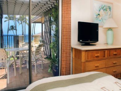 Guest bedroom with ocean view & flat screen TV