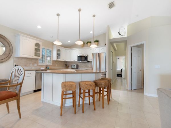 Charming Coastal Retreat with Bay Views and Timeless Style on Anna Maria Island