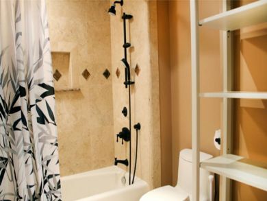 Master bathroom with tub and shower