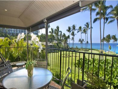 Lanai with outdoor table set & ocean view