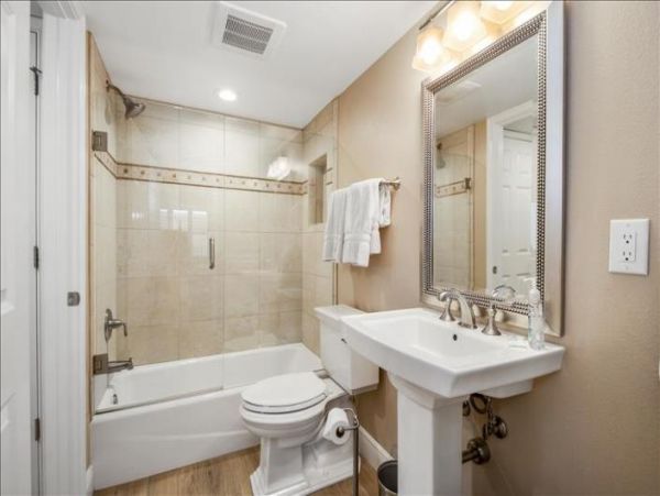 Beautiful 2 Bedroom Condo steps from the Beach