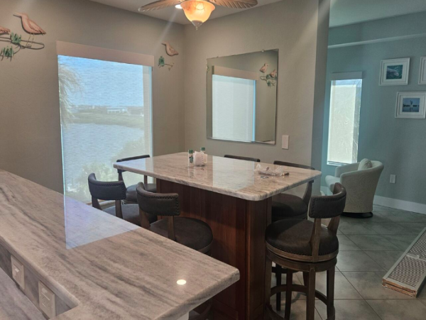 Charming 2-Bedroom Bayfront Condo with Panoramic Views