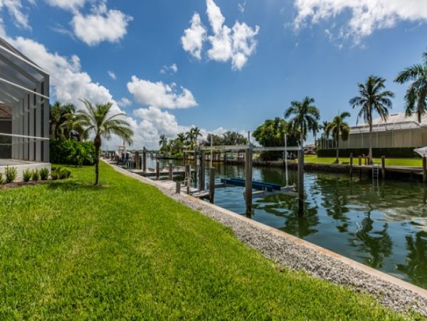 Luxury Marco Island Villa on the Canal with Caged Pool