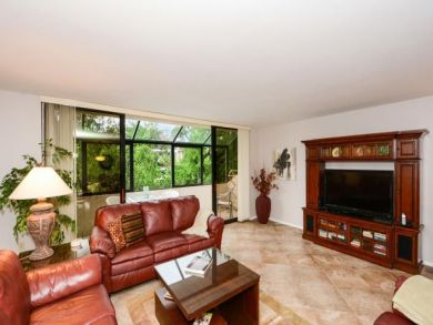 Located on Siesta Key White and Sandy Beach Call Now!
