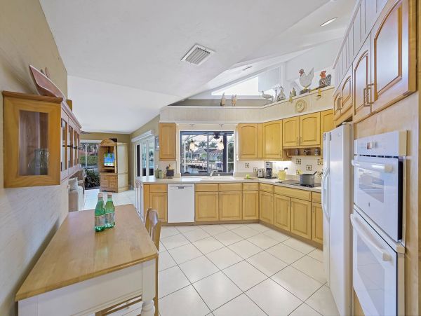 Marco Island Canal Front 3 Bedrooms Home with Caged Pool