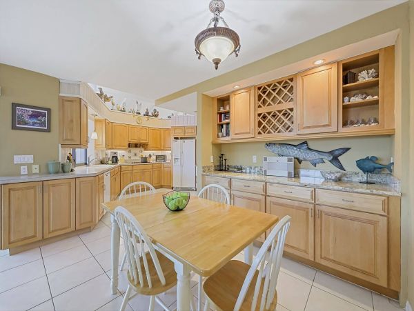 Marco Island Canal Front 3 Bedrooms Home with Caged Pool