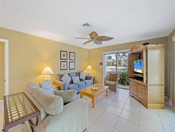 Marco Island Canal Front 3 Bedrooms Home with Caged Pool
