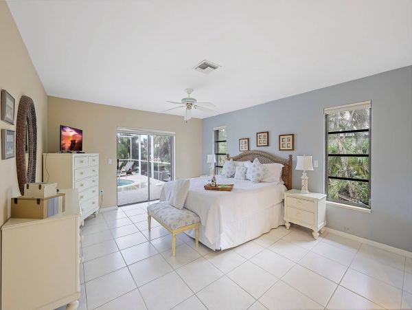 Marco Island Canal Front 3 Bedrooms Home with Caged Pool
