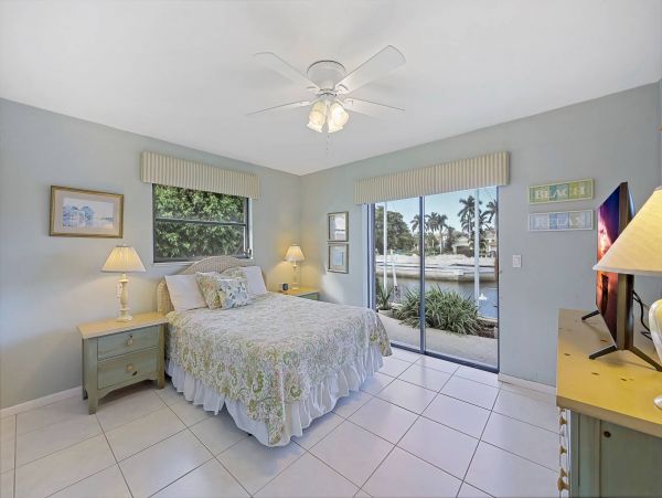 Marco Island Canal Front 3 Bedrooms Home with Caged Pool
