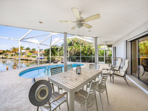 Marco Island Canal Front 3 Bedrooms Home with Caged Pool