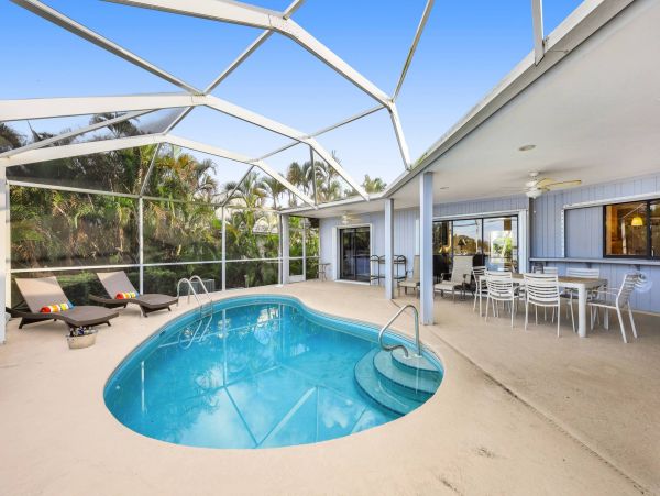 Marco Island Canal Front 3 Bedrooms Home with Caged Pool