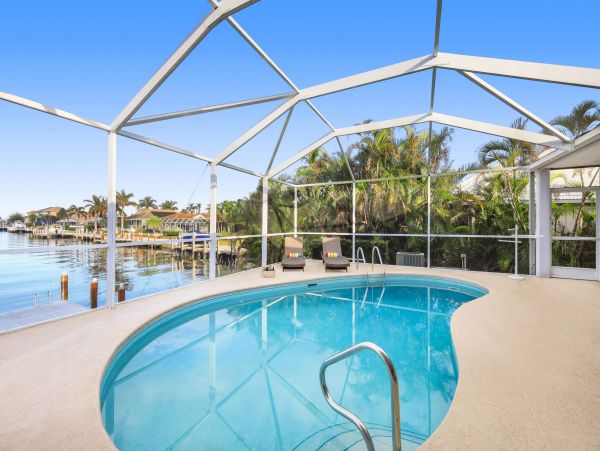 Marco Island Canal Front 3 Bedrooms Home with Caged Pool