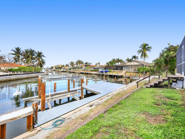 Marco Island Canal Front 3 Bedrooms Home with Caged Pool