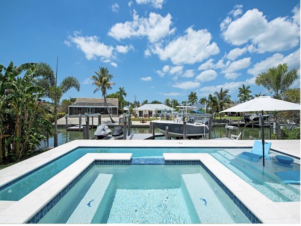 Beautiful 6 Bedroom Vacation Home Canal Front  Pool & Spa