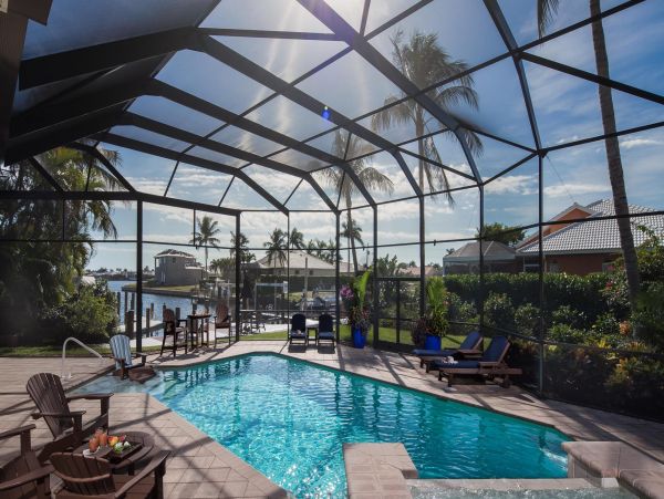 Canal Front  Vacation Home with Caged Pool in Marco Island