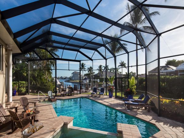 Canal Front  Vacation Home with Caged Pool in Marco Island