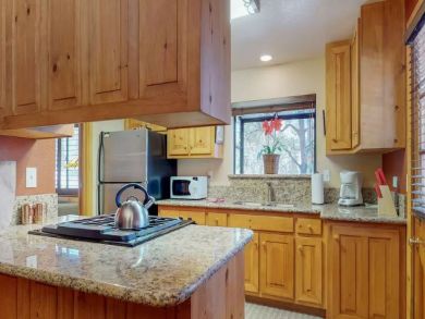 Warm and Inviting Rustic Home - Stone Fireplace and 2 Decks!
