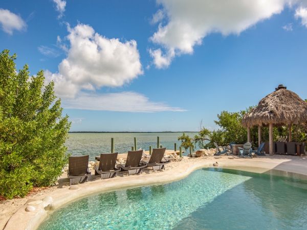 Key West Waterfront Home Four Bedrooms Dock Call Today.