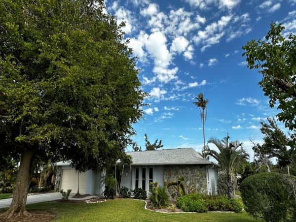 Walk to Beach Four Bedroom Sanibel Vacation Home