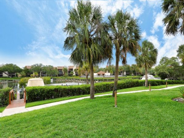 Canal-Front Vacation Condo with Pool and Tennis Court