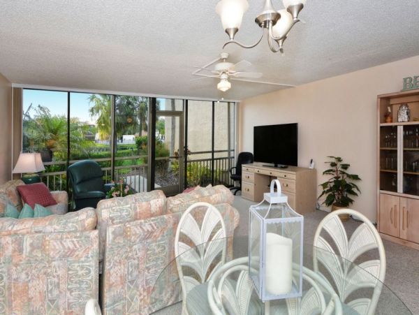 Canal-Front Vacation Condo with Pool and Tennis Court