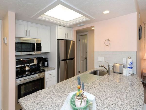 Canal-Front Vacation Condo with Pool and Tennis Court