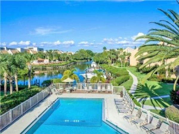 Canal-Front Vacation Condo with Pool and Tennis Court
