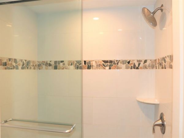 Walk to South Village from this bayside condo